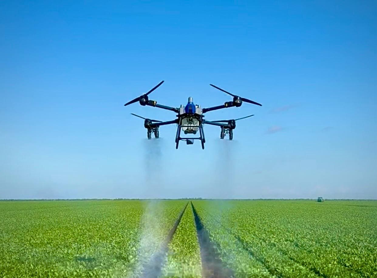 EAVision J150 agricultural spray drone in action